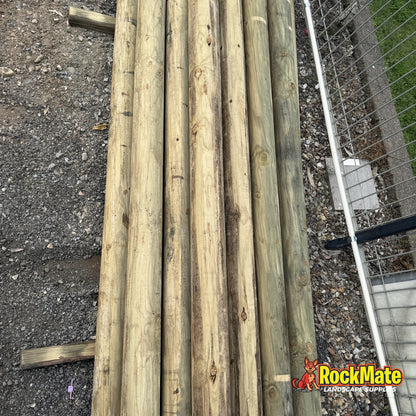 100mm treated pine round logs at the RockMate North Maclean yard