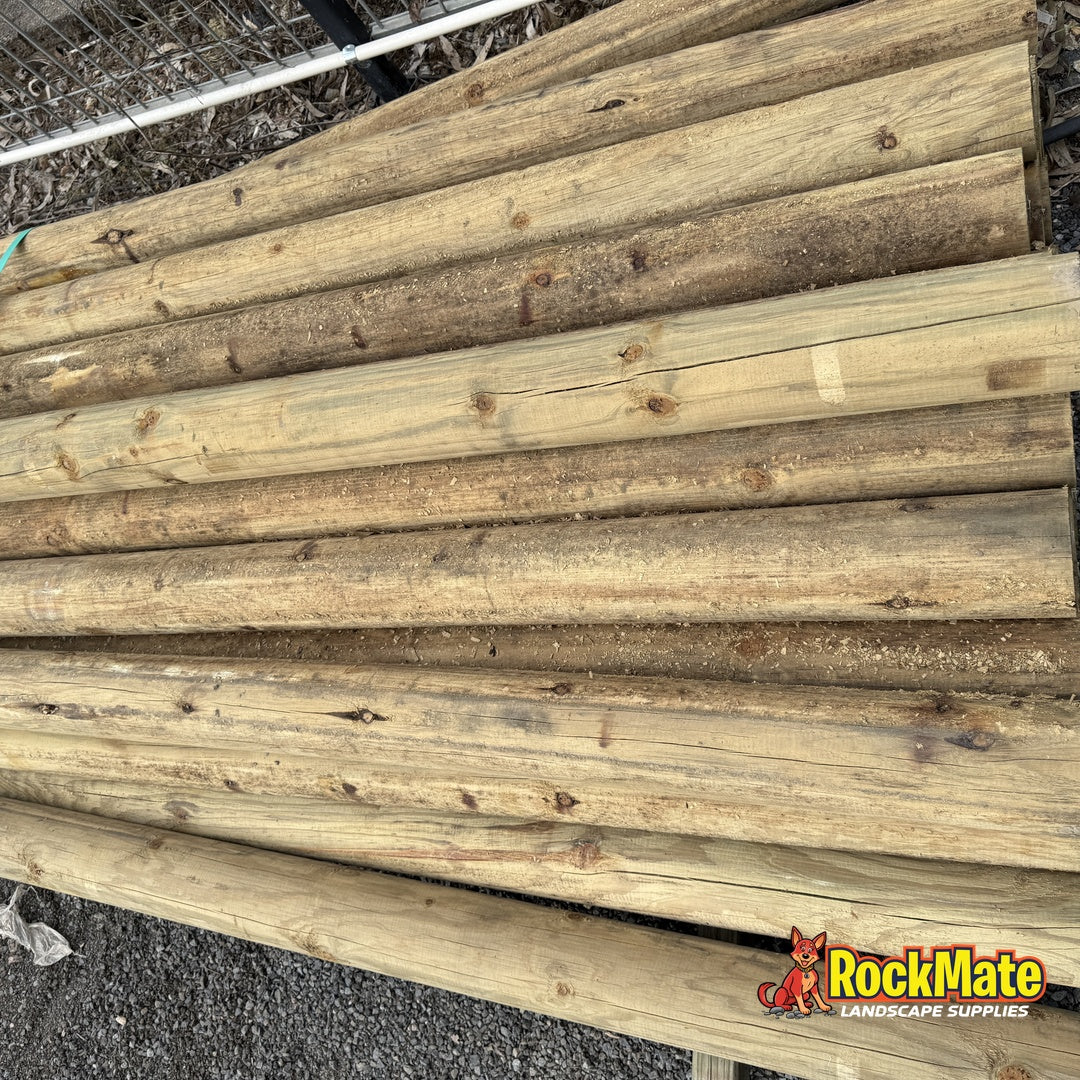 100mm treated pine round logs in 2.4m lengths at the RockMate yard