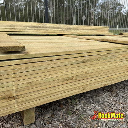 Treated pine garden edging 100 x 25mm stacked at the RockMate yard