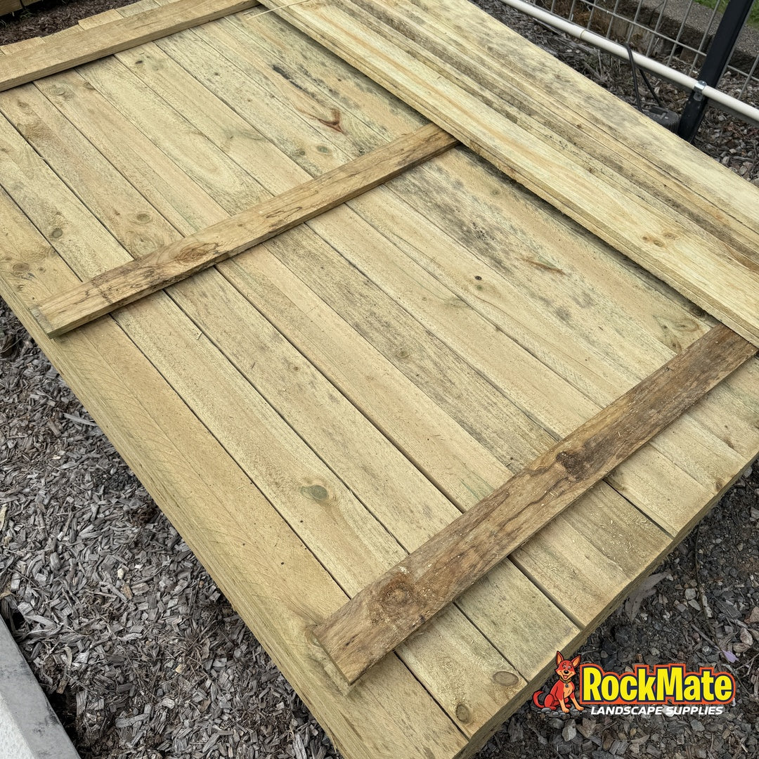 Treated pine flat top palings 100 x 16mm laid out at the RockMate yard